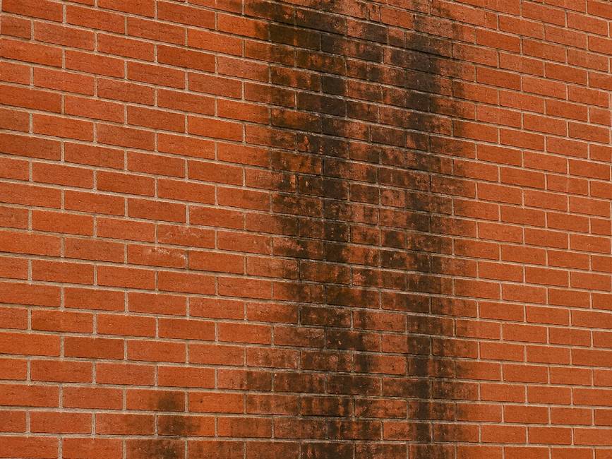 Brick wall before cleaning